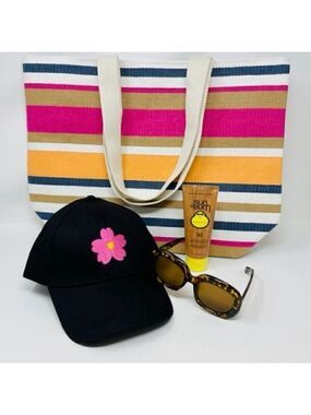 Sunbum SPF 50 Sunscreen, Beach Tote, flowered baseball cap, tortoise sunglasses